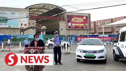 Beijing district on alert after new virus cluster
