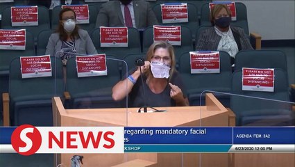 Anti-maskers rage at 'devil's laws' mandate in Florida's Palm Beach