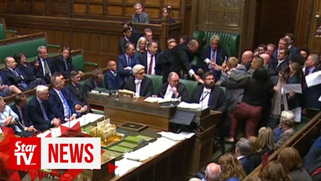 Protesting lawmakers pushed away during UK Parliament suspension