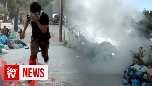Fire, clashes, one dead at crowded Greek migrant camp on Lesbos
