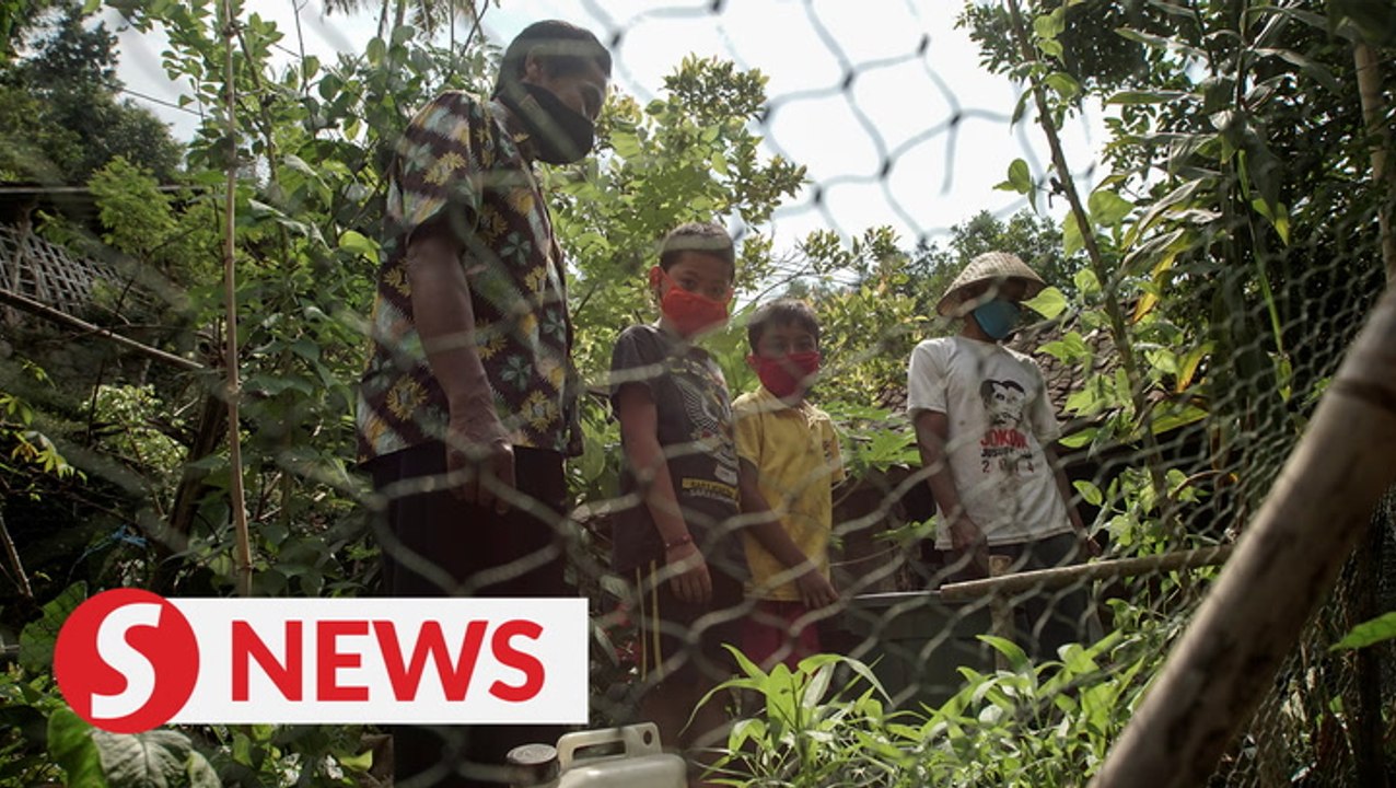 Indonesian teacher brings class to offline village students amid pandemic curbs