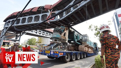 Download Video: Pedestrian bridge near Penang ferry terminal damaged by piling crane