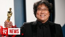 Bong Joon Ho is ready to 'drink, sing and dance' after Oscars sweep