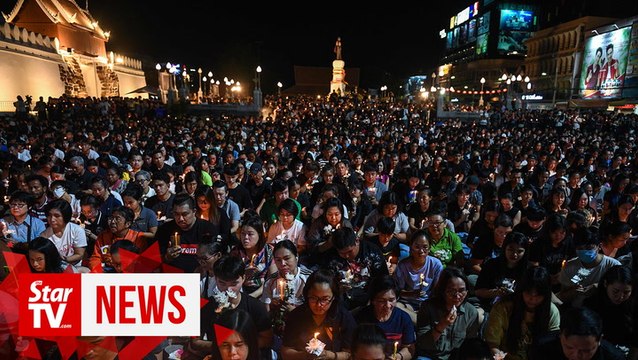 Thai city holds vigil for victims of mass shooting