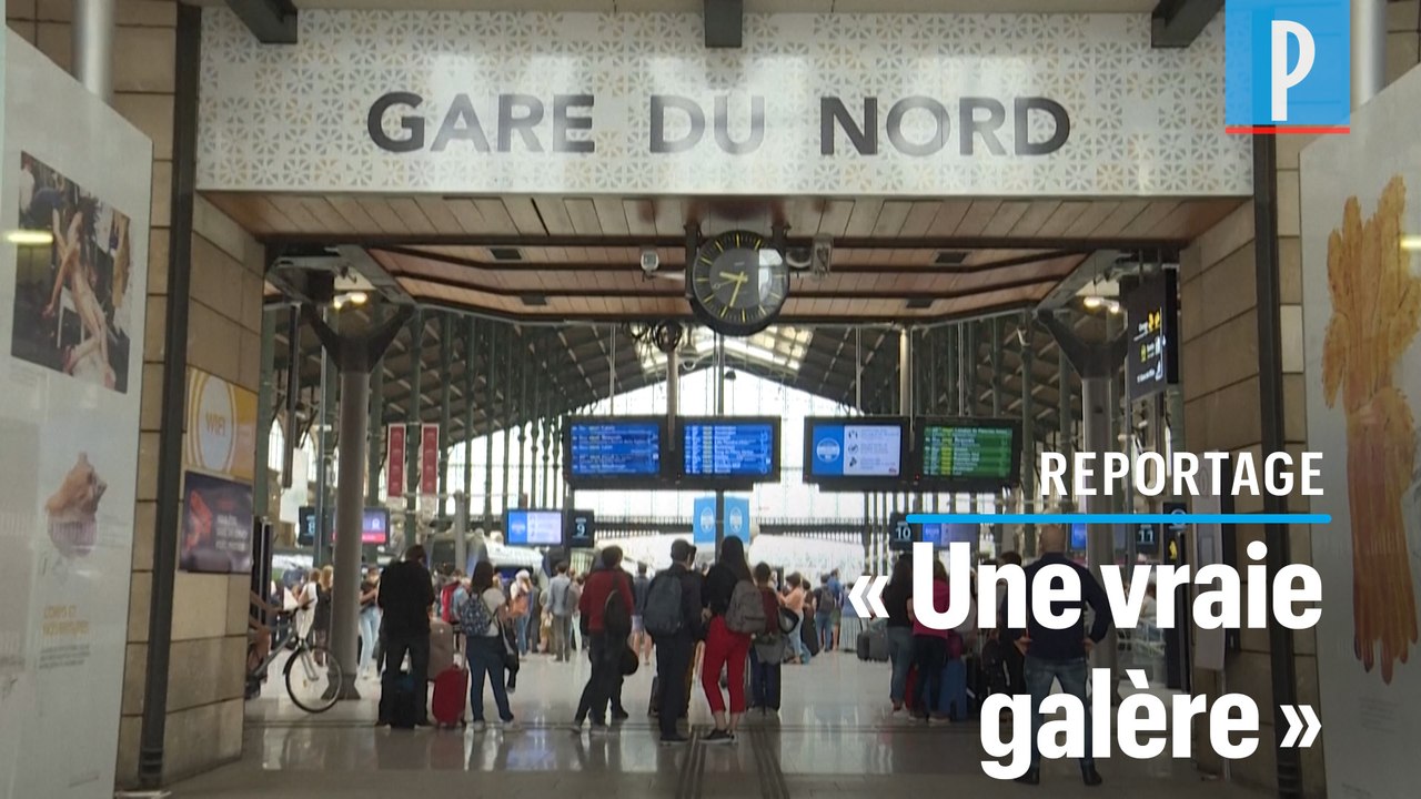 Gare du Nord, les voyageurs  pour l'Angleterre se préparent à passer quatorze jours à la maison