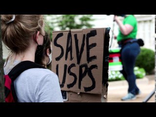 Trump defends postal service chief amid criticism