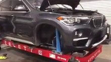 A nice 360 look of A BMW X1 on a Celette car frame machine at LA Collision Centers