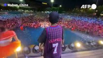 China's Wuhan goes wild as water party attracts thousands