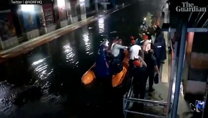 Mumbai flooding: monsoon rains inundate streets, homes and hospitals – video