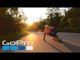 Guy Does Downhill Longboarding on Empty Street at High Speed