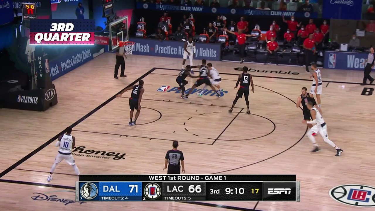Mavericks' Porzingis ejected after defending Do...