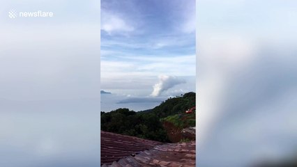 Steam rises from Taal volcano in the Philippines
