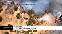 Firefighters battle raging wildfires in California amid heatwave