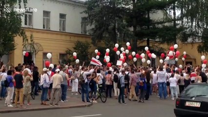 Belarusian protesters rally at detention centre holding opposition leader's husband