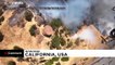 Firefighters battle raging wildfires in California amid heatwave