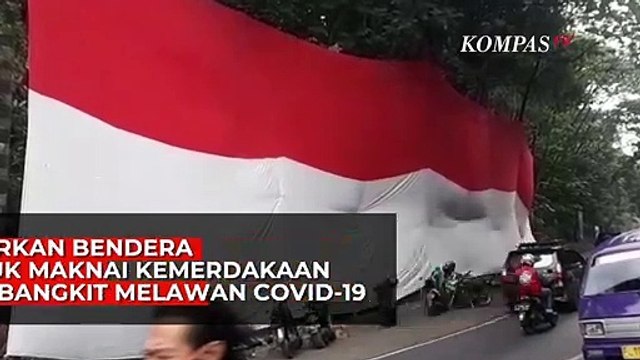 Komunitas Pecinta Alam Dan Komunitas Motor Bentangkan Bendera Merah Putih di Tebing Sukabumi
