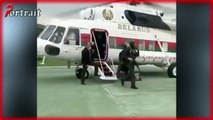 Belarus' President Lukashenko arrives Armed with a Rifle at presidential palace