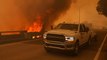 US: One dead, tens of thousands flee as fires rage in California