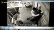 Moment brave security guard fights off armed robbers with his bare hands