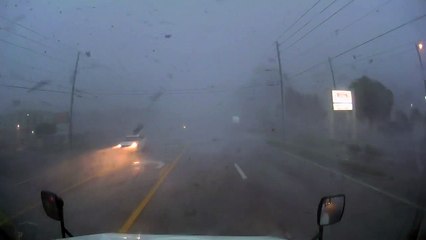 Tornado Turns over Truck on Highway