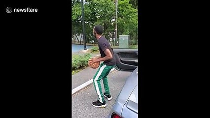 The most incredible basketball shot — and miss — you've ever seen ... from waaaaay downtown!