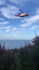 Coastguard rescue at South Bay cliffs, Scarborough