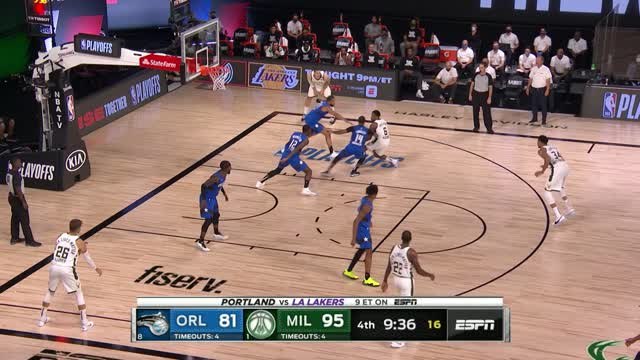 Giannis throws down a huge slam off the spin