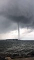 Water Spouts Touch Down Between Islands