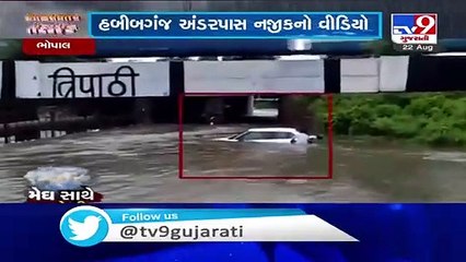 Car gets stranded at Habibganj underpass following heavy rainfall in Bhopal - TV9News
