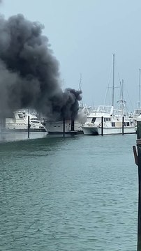 Boat Engulfed in Flames After Lightning Strike