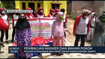 Polwan Di Makassar Bagi Paket Bahan Pokok Dan Masker Kepada Warga