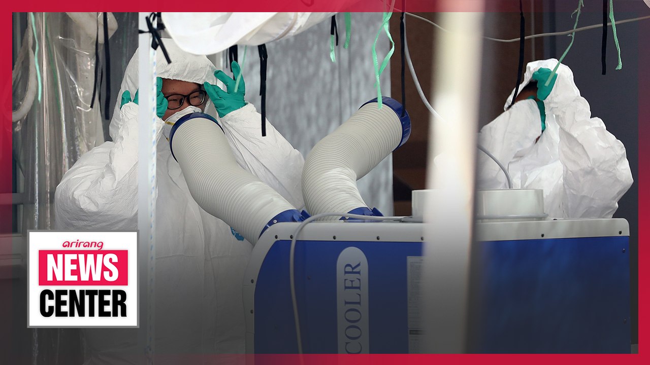 Frontline medical workers suffer from heat, fatigue amid prolonged COVID-19 pandemic