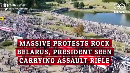 बेलारूस में जनता का सबसे बड़ा प्रदर्शन, असॉल्ट राइफल के साथ दिखे राष्ट्रपति लुकाशेंको