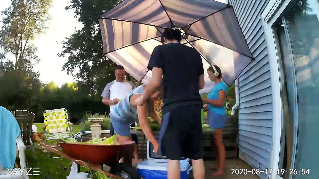 Family Shucking Corn in Timelapse