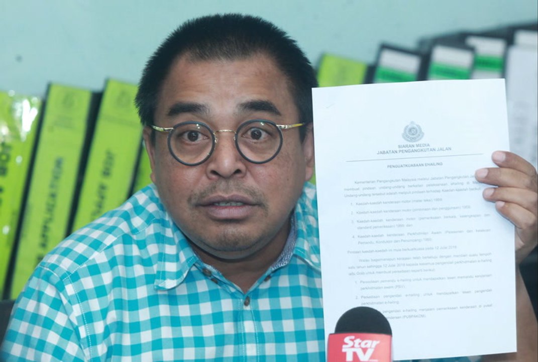 Taxi firm calls for closure of all waiting bays for e-hailing drivers