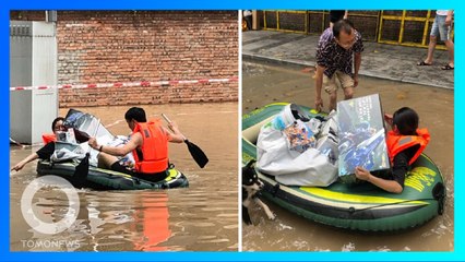 Download Video: Istri taruhkan nyawa demi selamatkan koleksi Gundam di tengah banjir - TomoNews