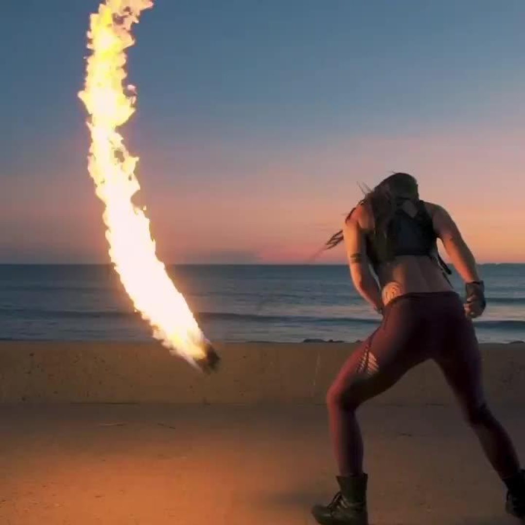 Girl Showcases Unique Talent by Doing Fire Rope Dart Tricks