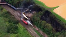 Homes evacuated after freight train catches fire in Wales