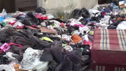 Tarsus'ta bir evden 8 kamyon çöp çıkarıldı