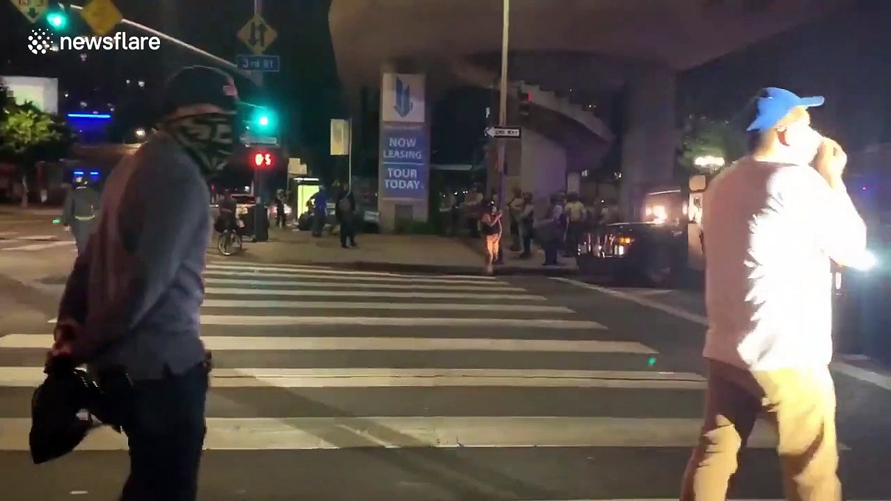 Protester confronts police during Jacob Blake protest in Los Angeles