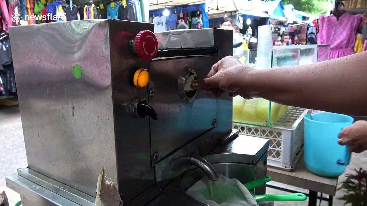 Freshly squeezed sugarcane juice sold on Bangkok streets for $0.60