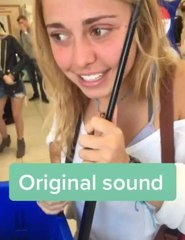 Girl Gets Head Stuck in Handle of Shopping Basket