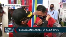 Pembagian Masker Untuk Warga Yang Lakukan Transaksi Non Tunai di SPBU