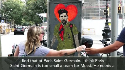 Fans visit graffiti in Barcelona that depicts Lionel Messi as a rebel