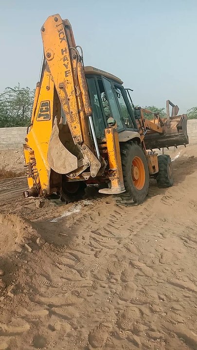 JCB 3CX Backhoe Loader Digging boundary For Wall.
