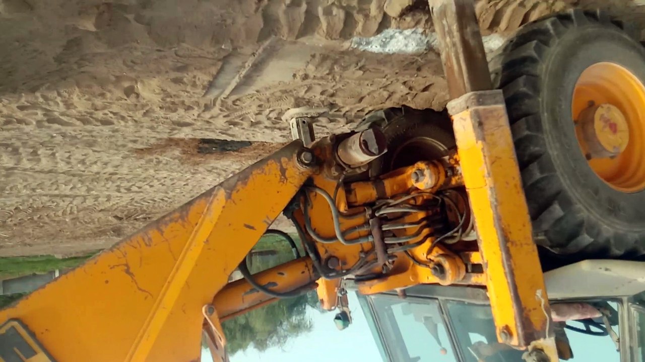 JCB 3CX Backhoe Loader Digging For Wall.