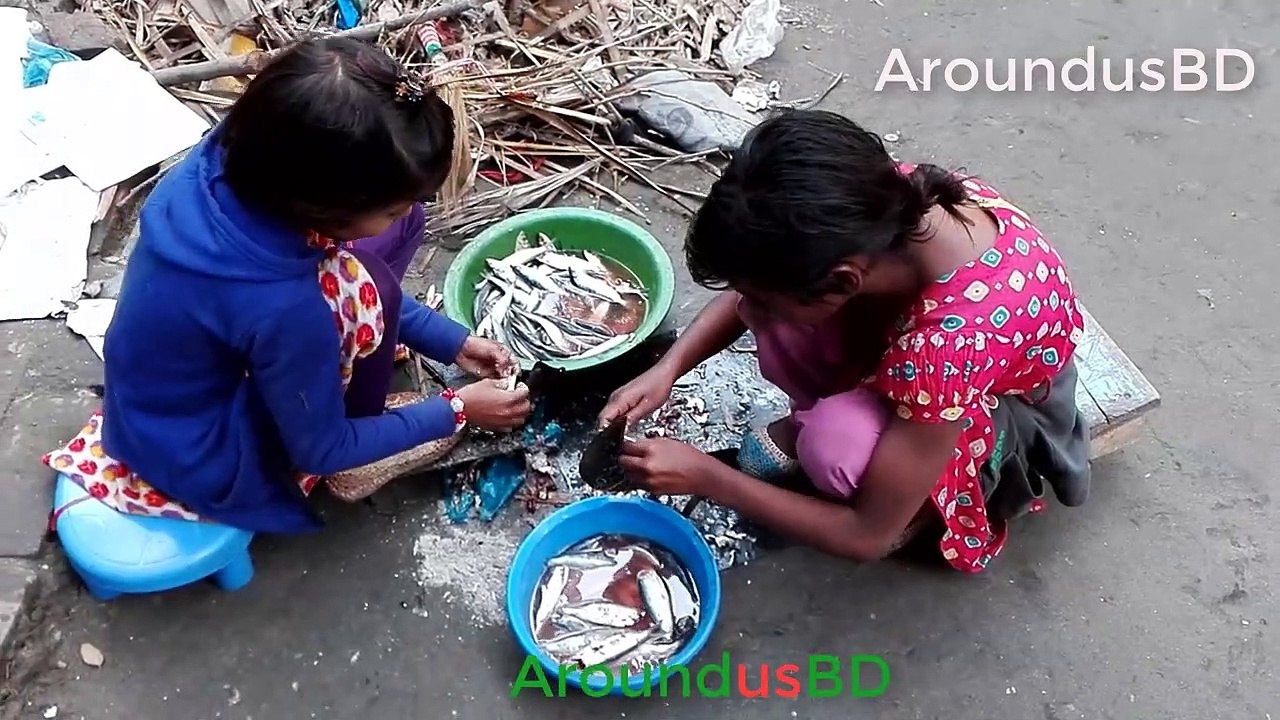 cutting fish village kids