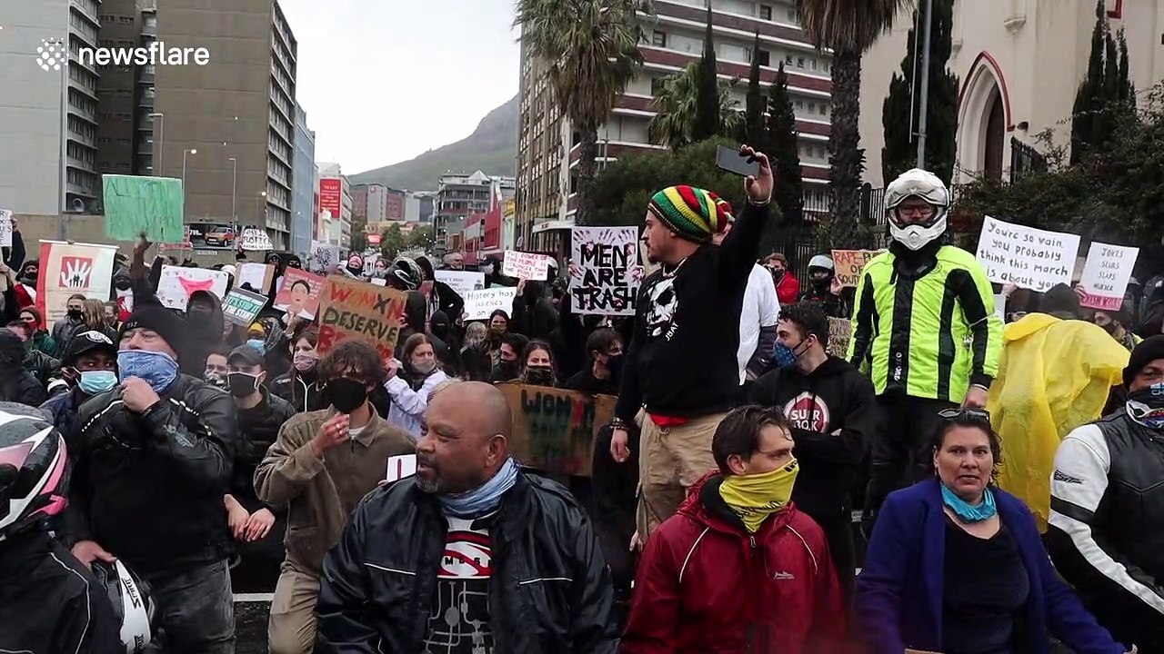 South African police and gender violence protesters clash in front of parliament