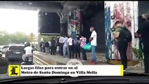 Largas filas para entrar en al Metro de Santo Domingo en Villa Mella
