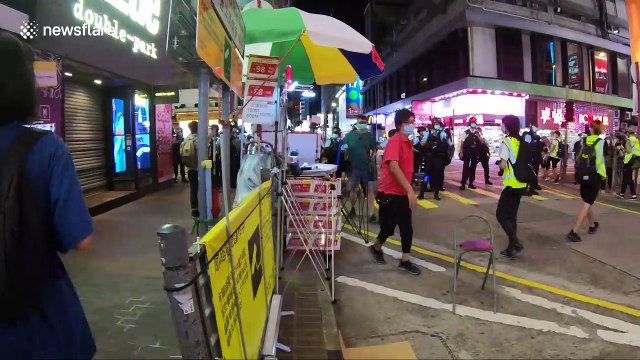 Police quash Hong Kong protesters trying to remember anniversary of violent clashes